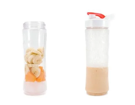Making smoothie in bottle with lid Stock Photos