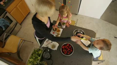 Making smoothie in kitchen Stock Footage 21243105
