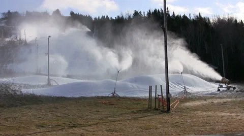 Making Snow Before Natural Snowfall on Ski Hill Stock Footage 33052613