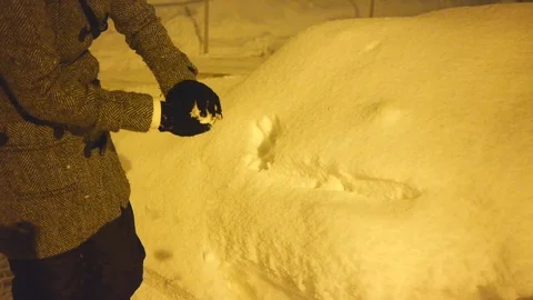 Making a snowball Video stock 69863007