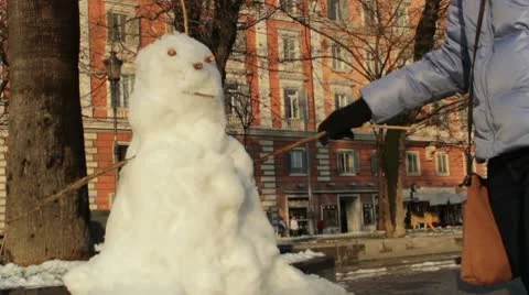 Making a snowman Stock Footage 10770295