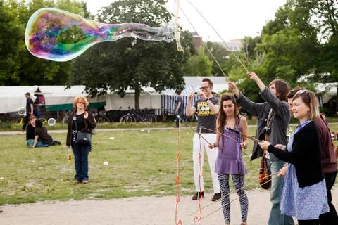 Making soap bubbles at mauerpark Stock Photos