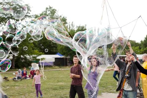 Making soap bubbles at mauerpark Stock Photos