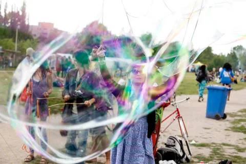 Making soap bubbles at mauerpark Stock Photos