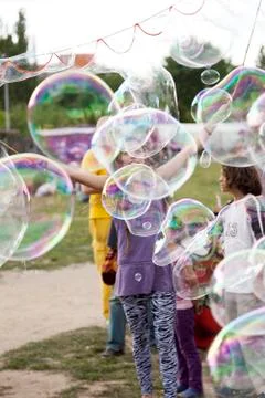 Making soap bubbles at mauerpark Stock Photos