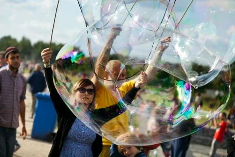 Making soap bubbles at mauerpark Stock Photos