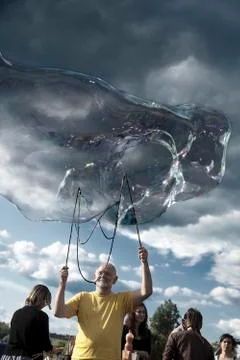 Making soap bubbles at mauerpark Stock Photos