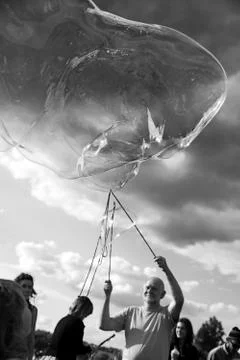Making soap bubbles at mauerpark Stock Photos