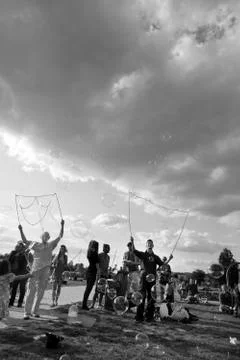 Making soap bubbles at mauerpark Stock Photos