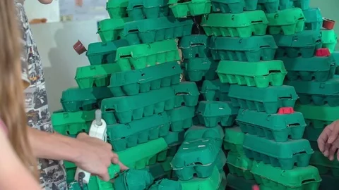 Making something out of egg carton Stock Footage 77676128