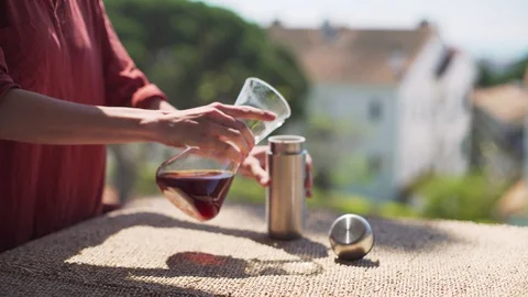 Making speciality coffee at home. Filter coffee on the terrace with a view. Girl Stock Footage 129318087