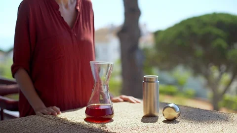 Making speciality coffee at home. Filter coffee on the terrace with a view. Girl Stock Footage 129318123