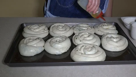 Making spinach pies Stock Footage 106648070