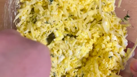 Making a spread from cheese, boiled eggs, dill, mustard and mayonnaise. Top view Stock-Footage 301882989