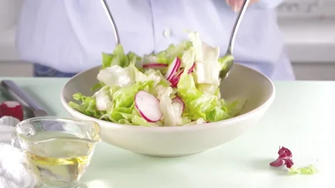 Making spring vegetable salad Video stock 169587371
