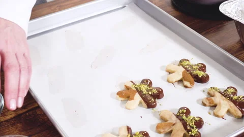 Making Star-Shaped Cookies with Chocolate and Peppermint Chips Stock Footage 317504221