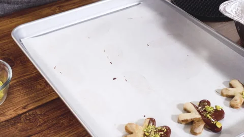 Making Star-Shaped Cookies with Chocolate and Peppermint Chips Stock Footage 317836854