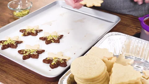 Making Star-Shaped Cookies with Chocolate and Peppermint Chips Stock Footage 317837151