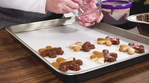 Making Star-Shaped Cookies with Chocolate and Peppermint Chips Stock Footage 319457055