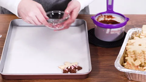 Making Star-Shaped Cookies with Chocolate and Peppermint Chips Stock Footage 319843506