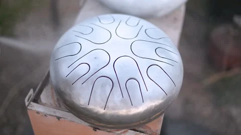 Making of a steel tongue drum. The process of painting and roasting Video stock 142240830