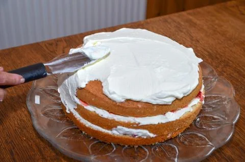 Making strawberry cake 2 Stock Photos