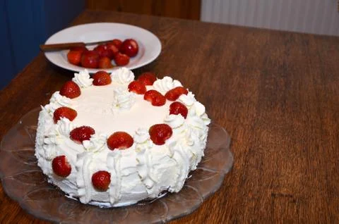 Making strawberry cake 4 Stock Photos