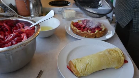 Making a strawberry crepe breakfast Stock Footage 54708847