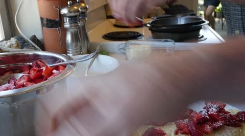 Making a strawberry crepe breakfast Stock Footage 54709031