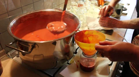 Making strawberry jam - pouring to jars Stock Footage 39159139