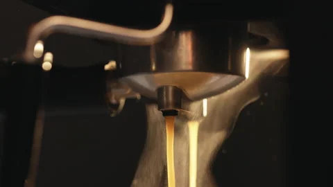 Making of strong coffee in a coffee machine, the back light illuminates the Stock Footage 194797572
