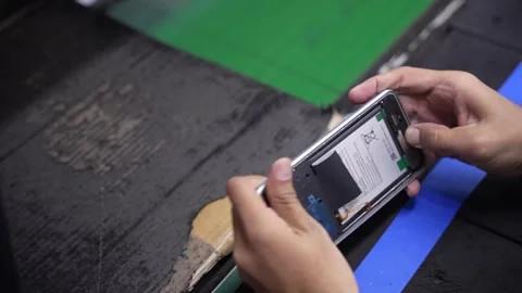 Making sure the casing is intact in android smartphone Production assembly line Видео 247154206