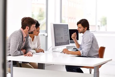 Making sure we are all on the same page. Portrait of a diverse group of Foto stock