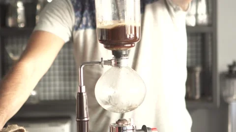 Making syphon coffee, syphon coffee is a new way to brew third generation coffee Stock Footage 67943643