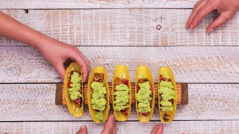 Making tacos - ingredients assembling the popular dish - stop motion animation Stock Footage 131587881
