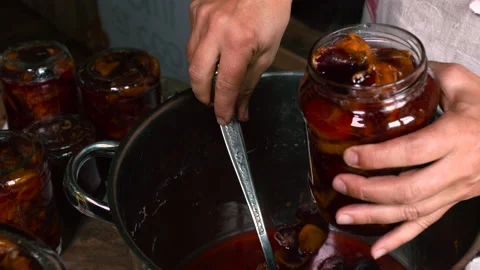 Making tasty plum compote Stock Footage 146111025