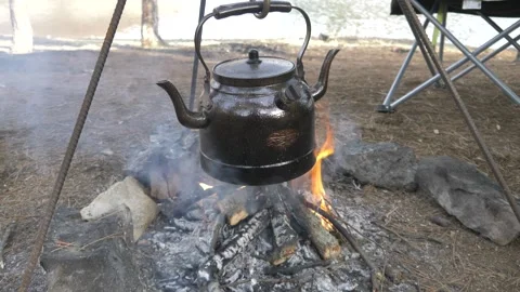 Making tea in the campfire_camping HD 1080 Stock Footage 147494098