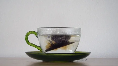 Making tea in a cup Stock Footage 83647403