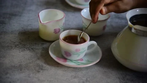 Making tea with milk and sugar Stock Footage 154199568