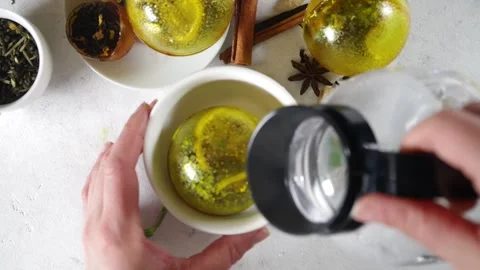 Making tea with tea ball bombs Stock Footage 168309076