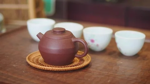 Making tea in a traditional setting Stock Footage 341542154