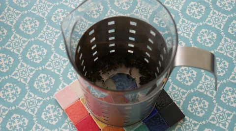 Making tea on a turquoise tablecloth Stock Footage 68908701