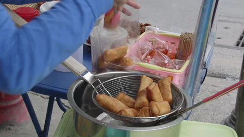 Making Thai Fried Spring Rolls Stock Footage 146871890
