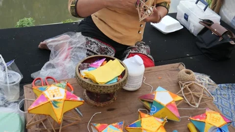 Making Thai paper lanterns for decoration Stock Footage 256758339