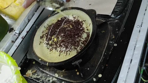 Making thick sweet pancake Stock Footage 259535335