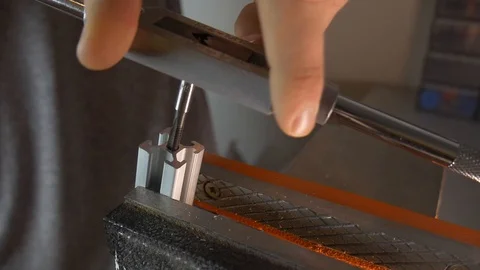 Making Thread In Aluminum Profile With Hand Tap Cinematic Stock Footage 114123070