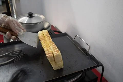 Making toast bread. Close up view Stock Photos