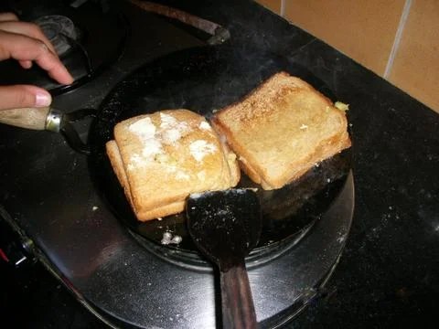 Making toast for breakfast Stock Photos