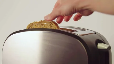 Making toast in slow motion Stock Footage 106810570