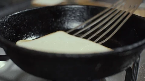 Making toasted bread on pan Stock Footage 125989037